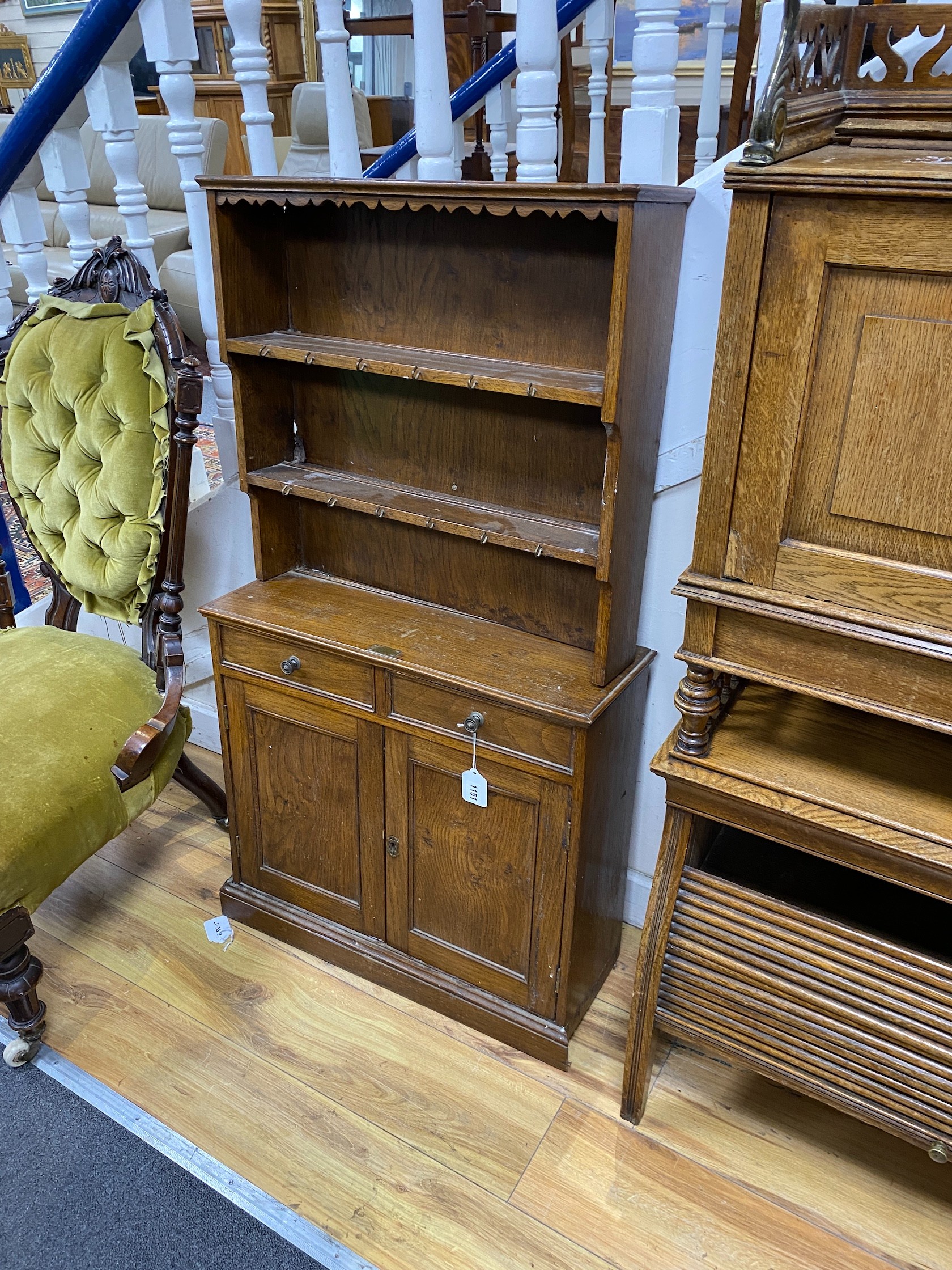 A mid 20th century oak miniature kitchen dresser, width 59cm, depth 21cm, height 108cm